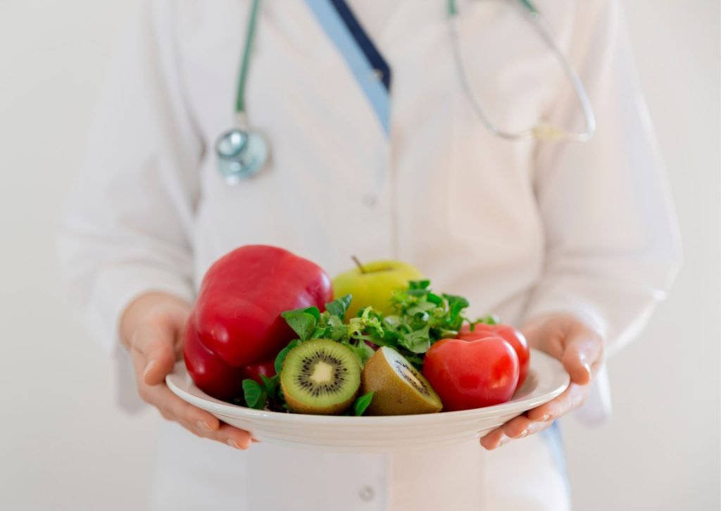 Doctor with vegetables